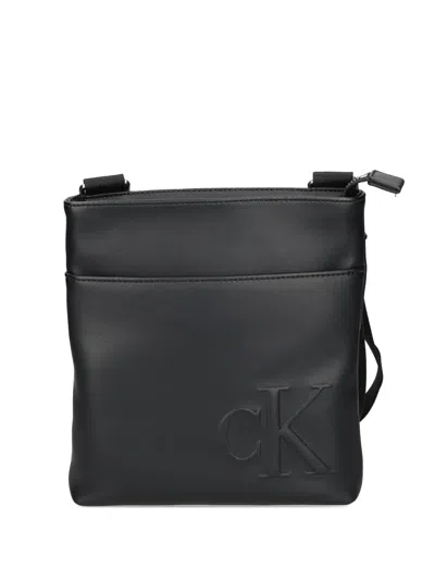 Calvin Klein Embossed-logo Messenger Bag In Black