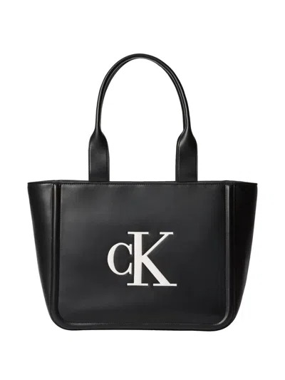 Calvin Klein Embossed-logo Tote Bag In Black