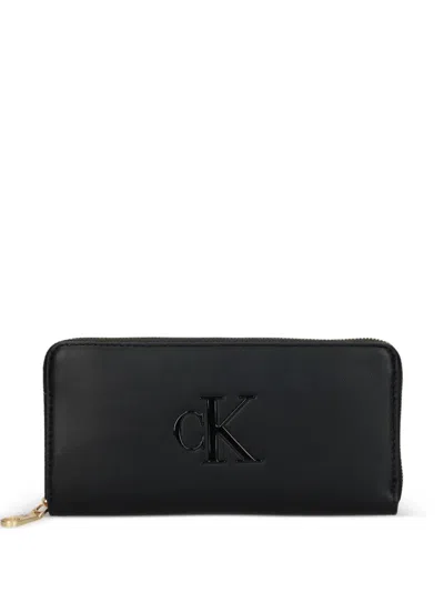 Calvin Klein Embossed-logo Wallet In Black