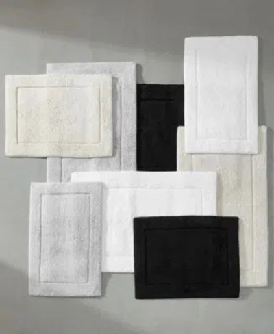 Calvin Klein Essence Solid Cotton Tufted Bath Rugs