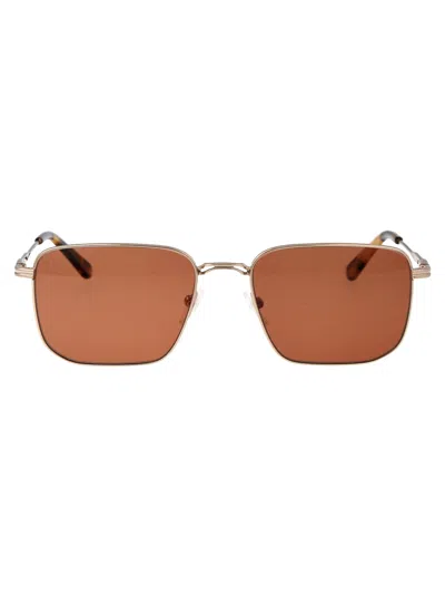 Calvin Klein Gold Metal Sunglasses In Brown