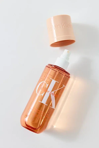 Calvin Klein Hair & Body Perfume Mist In Sheer Peach At Urban Outfitters In Orange