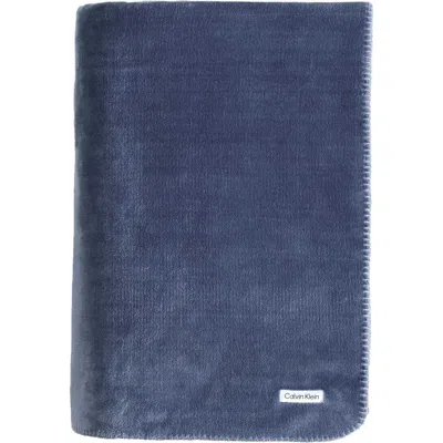 Calvin Klein Home Modern Reversible Solid Plush Blanket In Blue