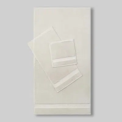 Calvin Klein Iconic Solid Cotton 3 Piece Towel Set In Beige