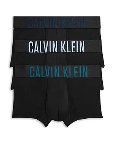 Calvin Klein Intense Power Low Rise Trunks, Pack Of 3 In Black W/ Atlantic Deep/blueberry/aquatic Logos