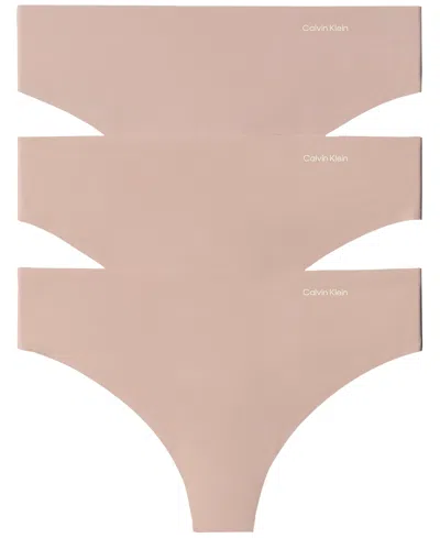 Calvin Klein Invisibles Seamless Microfiber Tag-free Thong, 3-pack, Qd5416 In Pink