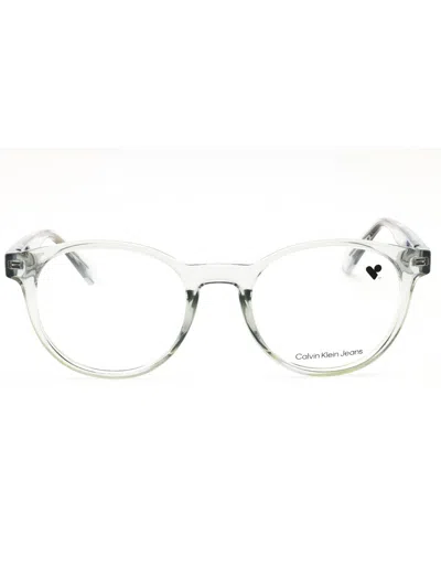 Calvin Klein Jeans Est.1978 Calvin Klein Jeans Modern Round Eyeglasses For Everyday Elegance In Transparent