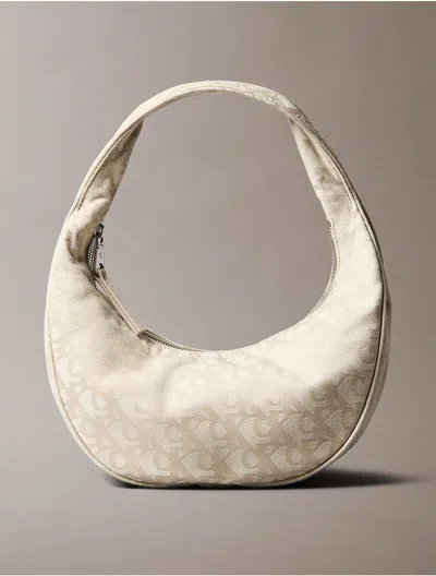 Calvin Klein Jeans Est.1978 Calvin Klein Women's Allover Monogram Logo Crescent Shoulder Bag In Brown