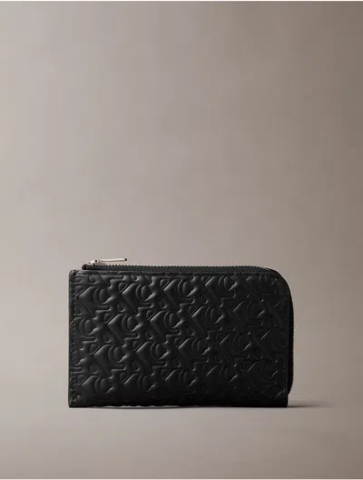 Calvin Klein Jeans Est.1978 Calvin Klein Women's Embossed Allover Monogram Zip Wallet In Black