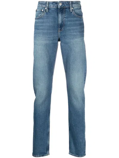 CALVIN KLEIN JEANS EST.1978 LOGO-PATCH SLIM-CUT JEANS
