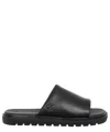 Calvin Klein Jeans Est.1978 Embossed Slide Sandals In Black