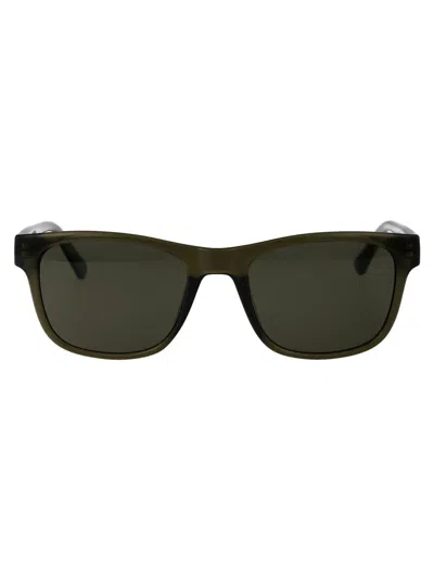 Calvin Klein Jeans Sunglasses In 314 Crystal Olive