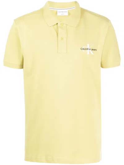 Calvin Klein Logo-embroidered Short-sleeve Polo Shirt In Yellow