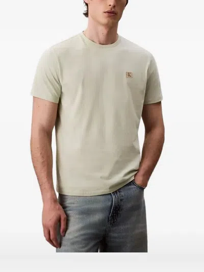 Calvin Klein Logo-plaque Cotton Polo Shirt In Neutral