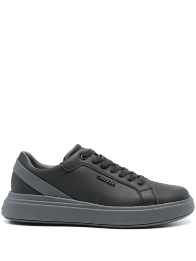 Calvin Klein Logo-plaque Leather Sneakers In Black