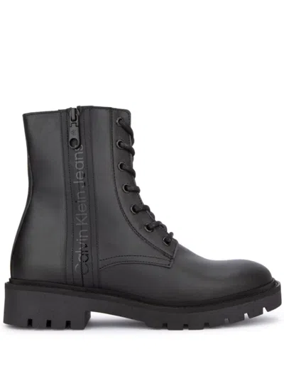 CALVIN KLEIN LOGO-PRINT BOOTS