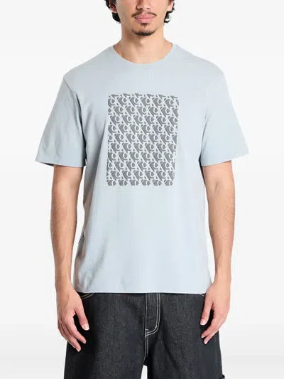 Calvin Klein Logo-print Pattern Short-sleeved T-shirt In Blue