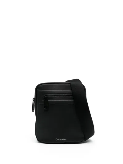 Calvin Klein Logo-stamp Messenger Bag In Black