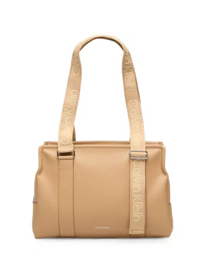 Calvin Klein Logo-strap Pebbled-effect Tote Bag In Brown