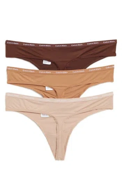 Calvin Klein Luxe 3-pack Thongs In Umber/cedar