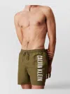 Calvin Klein Medium Drawstring Swim Shorts Featuring Pockets In Green