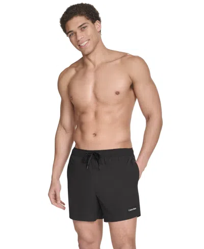 Calvin Klein Men's Core Euro Regular-fit Quick-dry 5" Swim Trunks With Compression Short Liner In Black