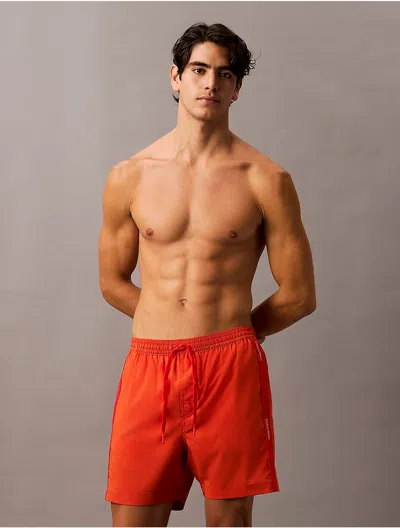 Calvin Klein Men's Core Solid Swim Shorts In Orange