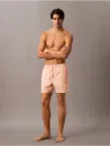 Calvin Klein Men's Core Solid Swim Shorts In Melon Frenzy