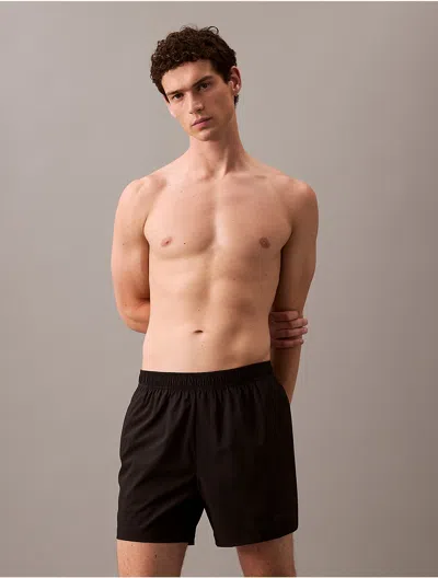 Calvin Klein Men's Logo Badge Solid Swim Shorts In Black Beauty