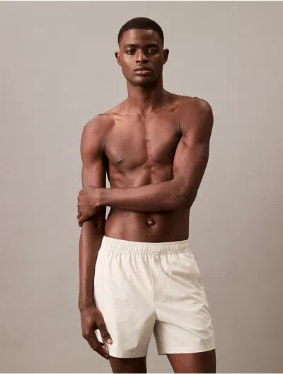 Calvin Klein Men's Logo Badge Solid Swim Shorts In Chalk