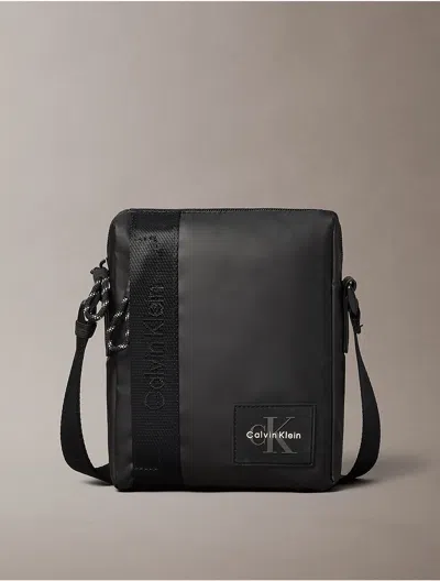 Calvin Klein Men's Monologo Patch Reporter Bag In Purple