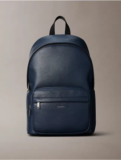 Calvin Klein Men's Raised Logo Round Backpack In Blue Nights