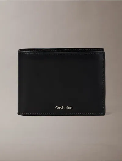 Calvin Klein Men's Raised Logo Trifold Wallet In Black