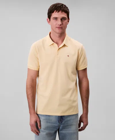 Calvin Klein Men's Regular-fit Smooth Cotton Monogram Logo Polo Shirt In Yellow