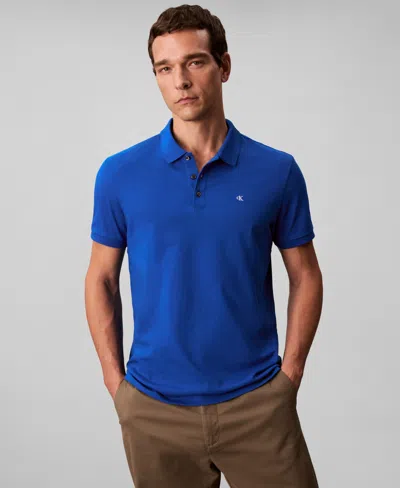 Calvin Klein Men's Short Sleeve Solid Polo Shirt In Blue