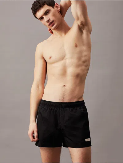 Calvin Klein Men's Solid Tonal Swim Shorts In Black