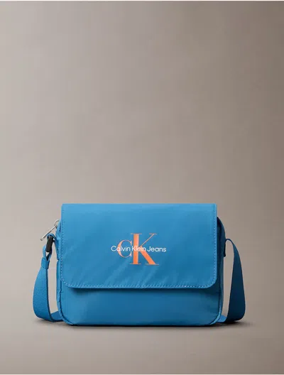 Calvin Klein Men's Sport Essentials Flap Crossbody Bag In Bayside Blue
