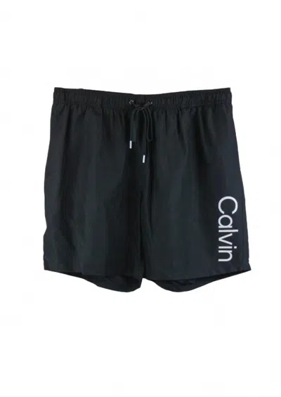 Calvin Klein Men's Standard Uv Protected Quick Dry Swim Trunk In Black In Blue