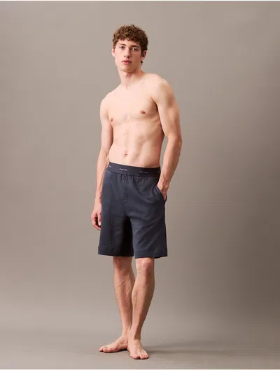 Calvin Klein Rubberised-logo Shorts In Black