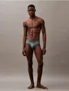 Calvin Klein Men's Tonal Logo Hip Brief In Blue Performance