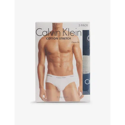 Calvin Klein Mens  Hip Low-rise Classic-fit Pack Of Three Cotton-jersey Briefs In Blk, Diam Grey,ston