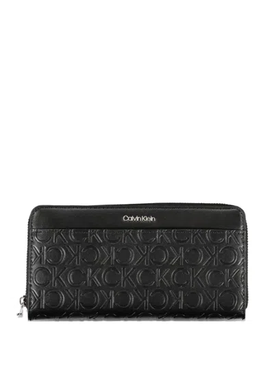 Calvin Klein Monogram-embossed Zip-around Wallet In Black
