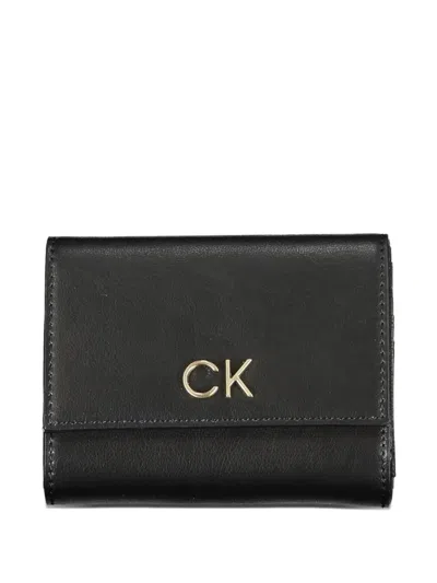 Calvin Klein Monogram-plaque Trifold Wallet In Black