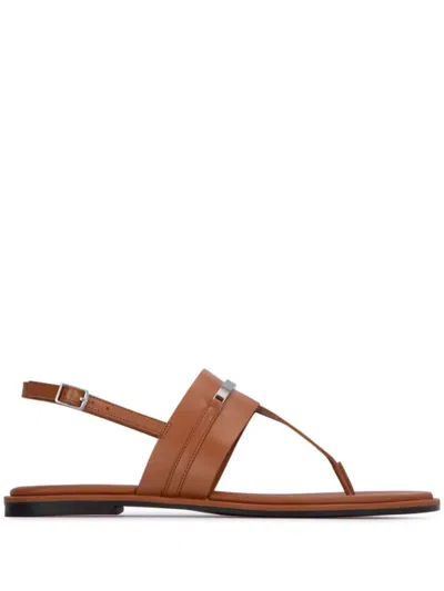 CALVIN KLEIN PLAQUE LEATHER SANDALS