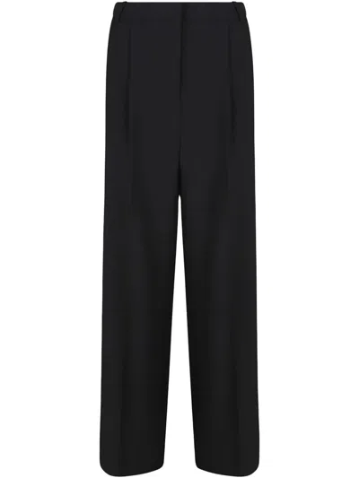 CALVIN KLEIN PLEATED-FRONT TROUSERS