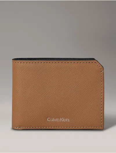 Calvin Klein Saffiano Leather Slim Bifold Wallet In Burro