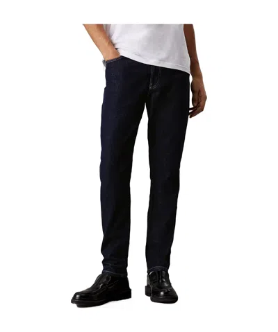Calvin Klein Tapered Jeans In Black