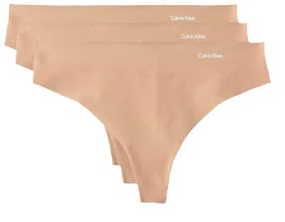 Calvin Klein Women's 3 Pack Invisibles Thong Panties In Light Caramel In Multi