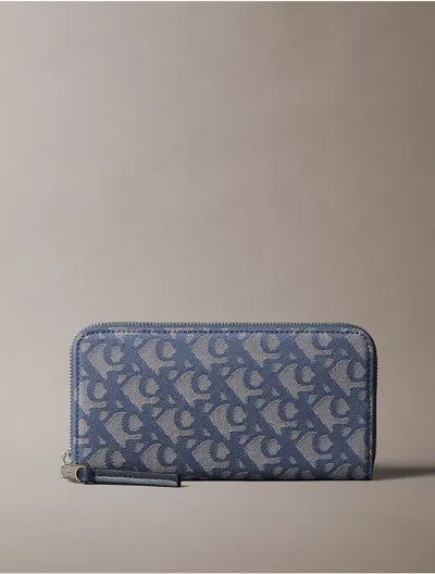 Calvin Klein Women's Allover Monogram Long Zip Wallet In Blue