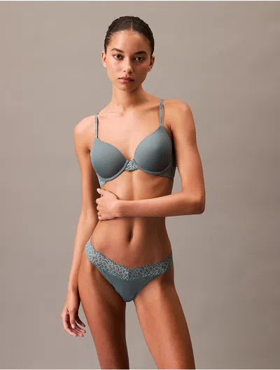 Calvin Klein Women's Attraction Thong In Blue Performance